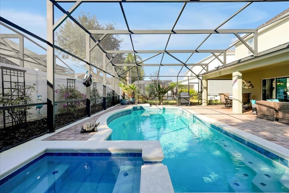 Take a dip in the sparkling screened-in pool or soak in the integrated spa. This private outdoor space is perfect for cooling off after a fun-filled day at the theme parks.