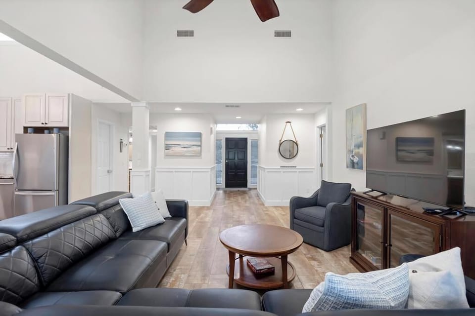 Cozy lounge setup w/ plush seating for movie nights or quiet evenings.