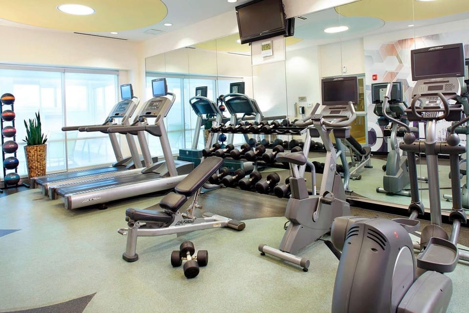 Cardio machines, free weights and benches for a full workout