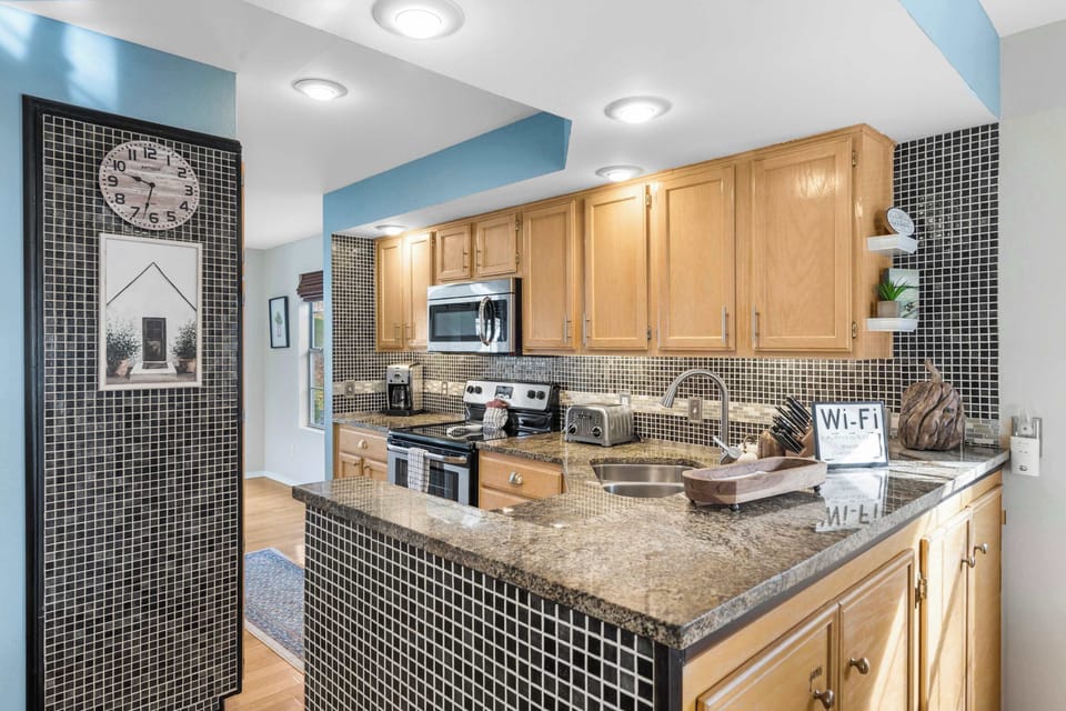 Condo, Multiple Beds, Patio, Garden View (Premiere Pointe) | Private kitchen
