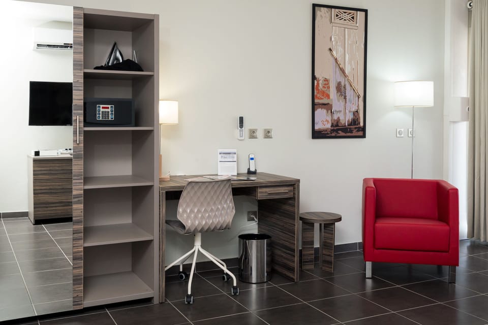 Suite Confort, 1 large bed, balcony and kitchen | Room amenity