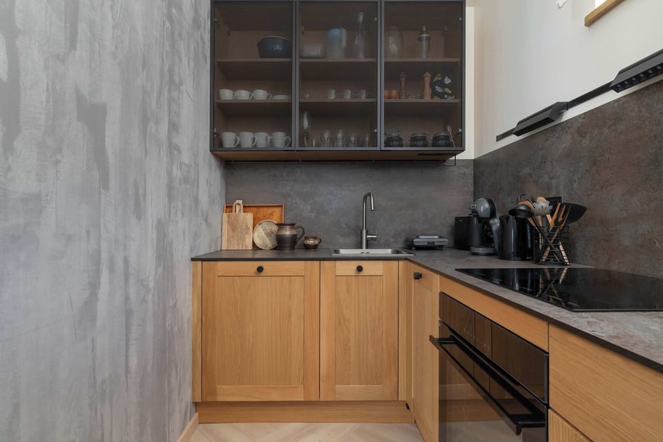 The kitchenette's practical layout maximizes space and functionality.