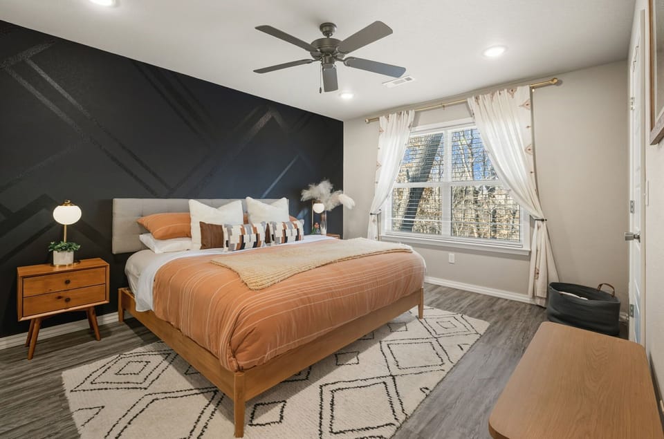 Primary bedroom - King size bed, closet, and an attached bathroom.