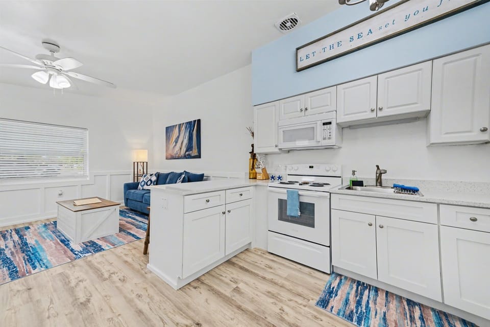 Fully equipped kitchen with modern appliances and open layout