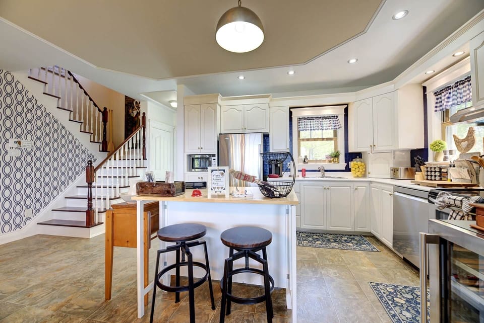 Kitchen and staircase leading to the upper floor