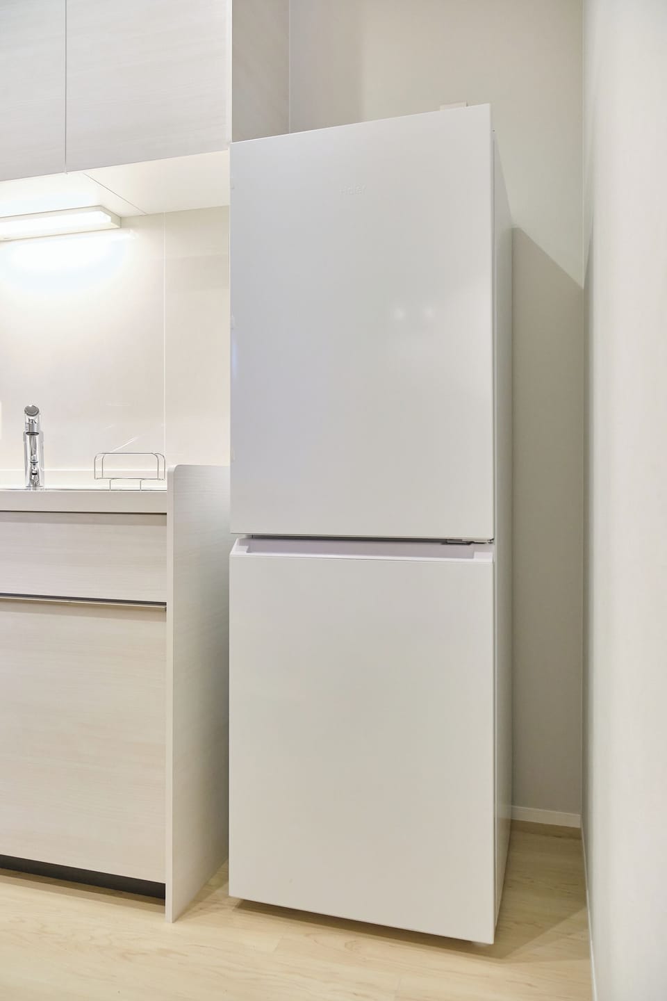 Comfort Condo, Non Smoking | Private kitchen | Electric kettle, cleaning supplies, dining tables