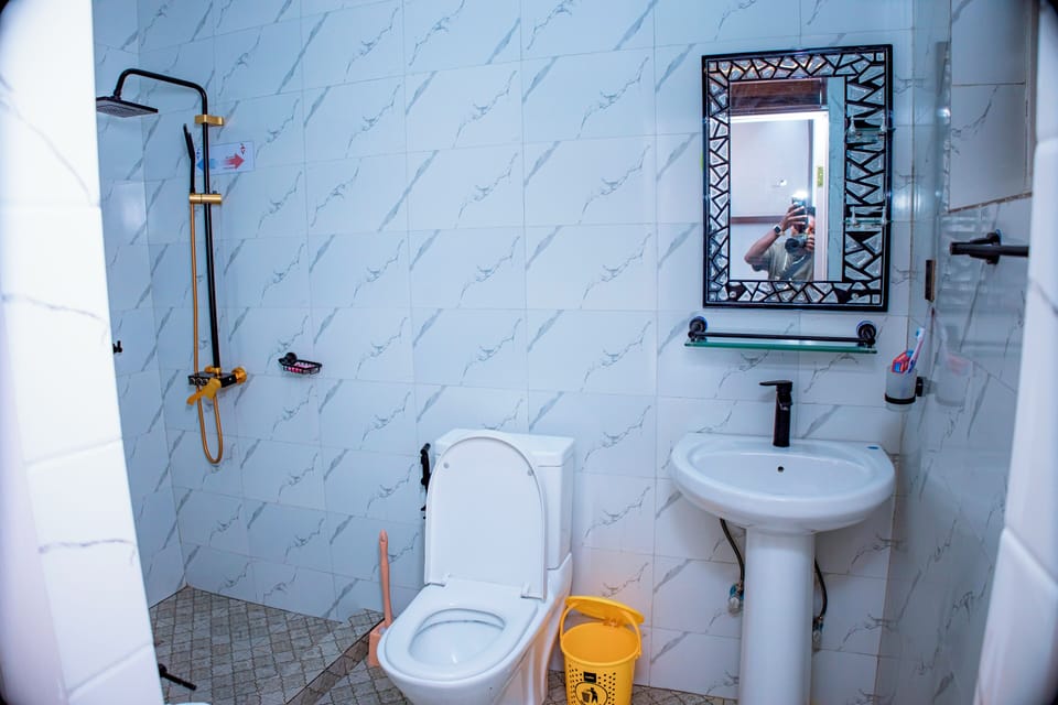 Deluxe Double Room, Lake View | Bathroom | Hair dryer, slippers, towels, soap