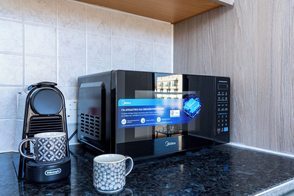 Apartment, 2 Bedrooms, Kitchen, City View | Private kitchen | Espresso maker, coffee/tea maker, full-size fridge, microwave