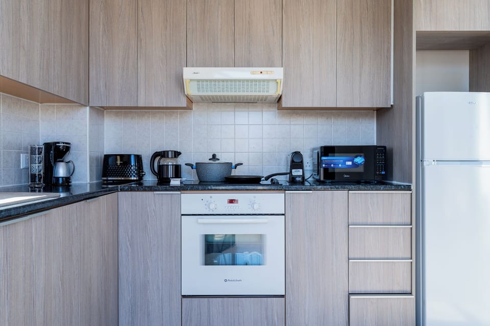 Apartment, 2 Bedrooms, Kitchen, City View | Private kitchen | Espresso maker, coffee/tea maker, full-size fridge, microwave