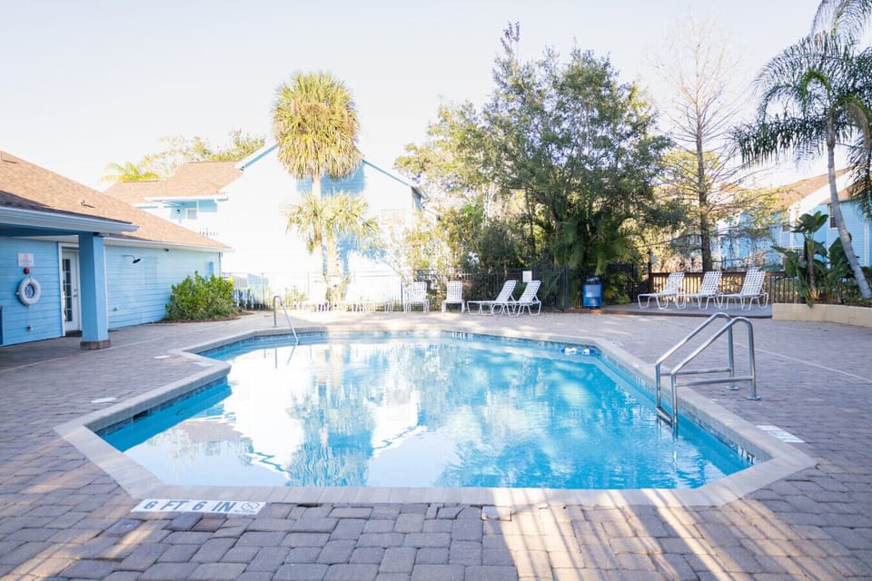 Resort-Style Community Pool with Lounge Seating. Cool off after Disney or enjoy a relaxing afternoon in the Florida sun.