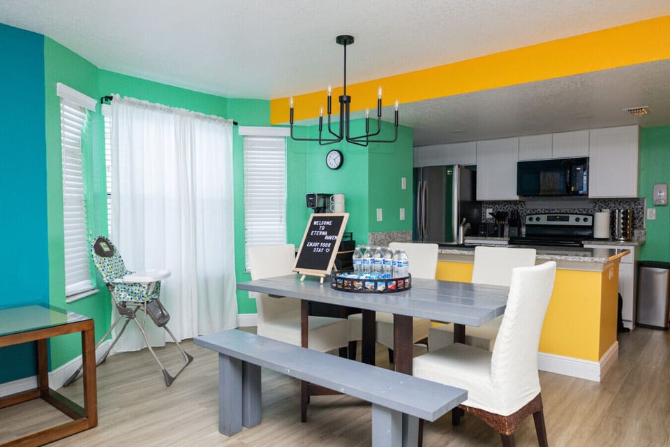Dining Area with Seating for Family Meals and Game Nights. Open layout connects seamlessly to the kitchen and living room.