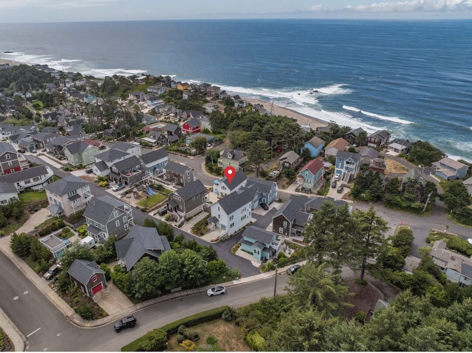 Nestled in Olivia Beach, just a short walk from the shoreline.