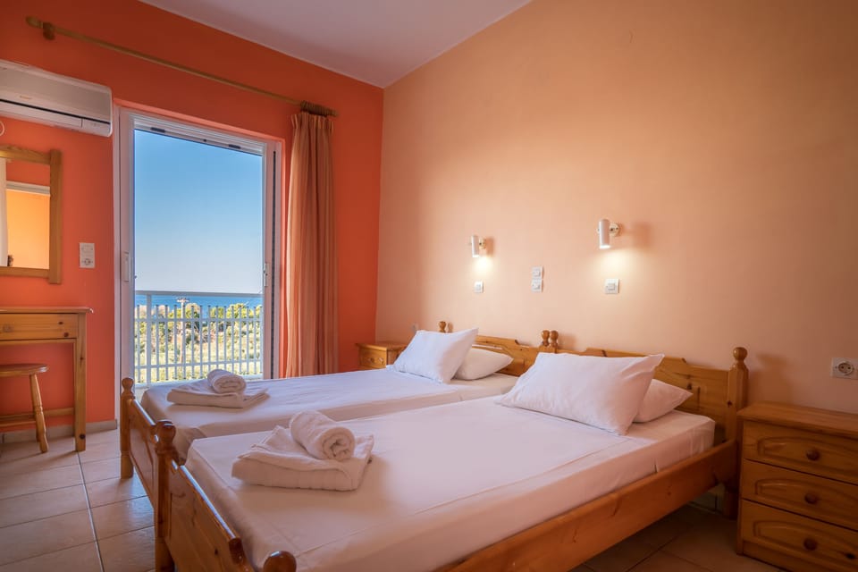Apartment, 2 Bedrooms, Sea View | In-room safe, free cribs/infant beds, rollaway beds, free WiFi