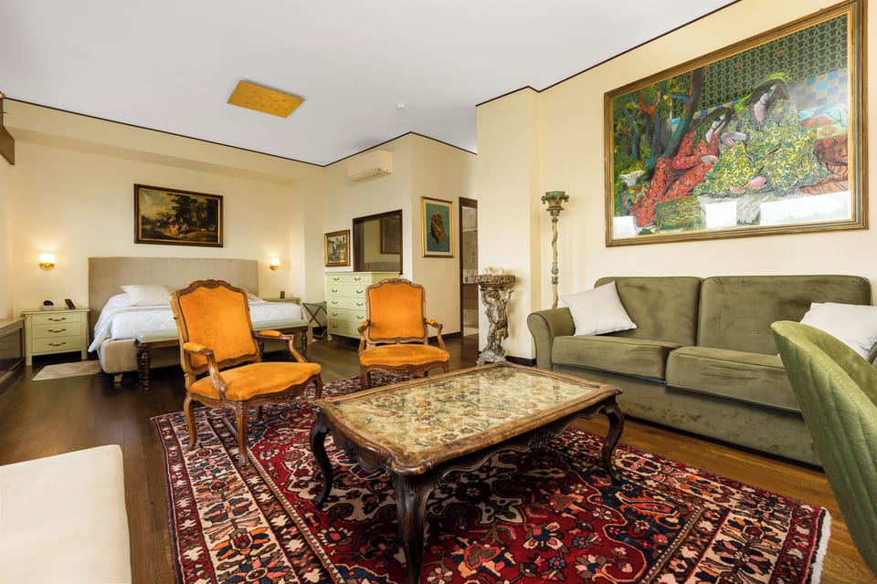 Luxury Suite, Sea View | In-room safe, laptop workspace, soundproofing, iron/ironing board