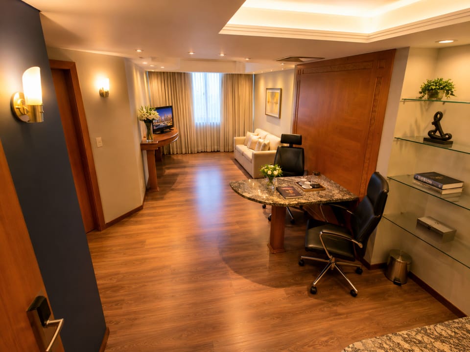 Premier Studio Suite | Living area | 43-inch Smart TV with cable channels, Netflix, streaming services