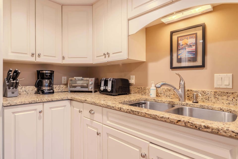 Enjoy the convenience of a well-stocked, modern kitchen designed for effortless vacation living.