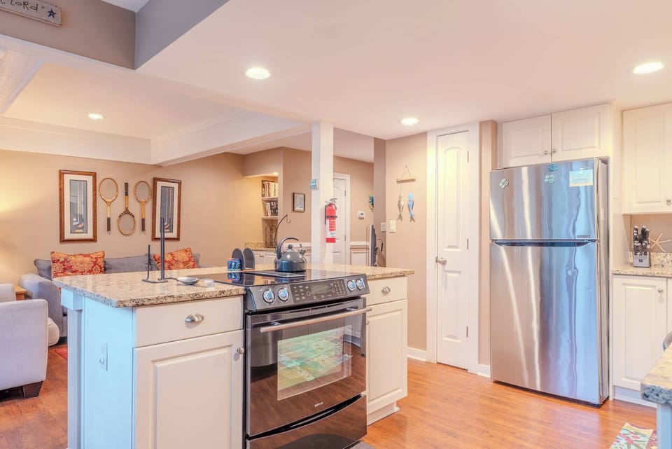 Cook, gather, and enjoy — this updated kitchen features plenty of space and all the essentials.