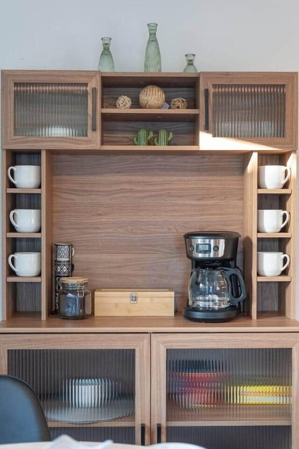 A charming coffee bar stocked with ground coffee to kickstart your day, plus a variety of tea options for a cozy, relaxing start.