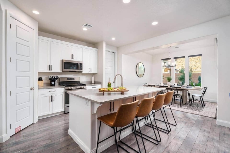 Fully stocked kitchen with plenty of dishes, a Keurig and drip coffee maker, kids’ dishes, and ample seating—everything you need for easy meals and family gatherings.