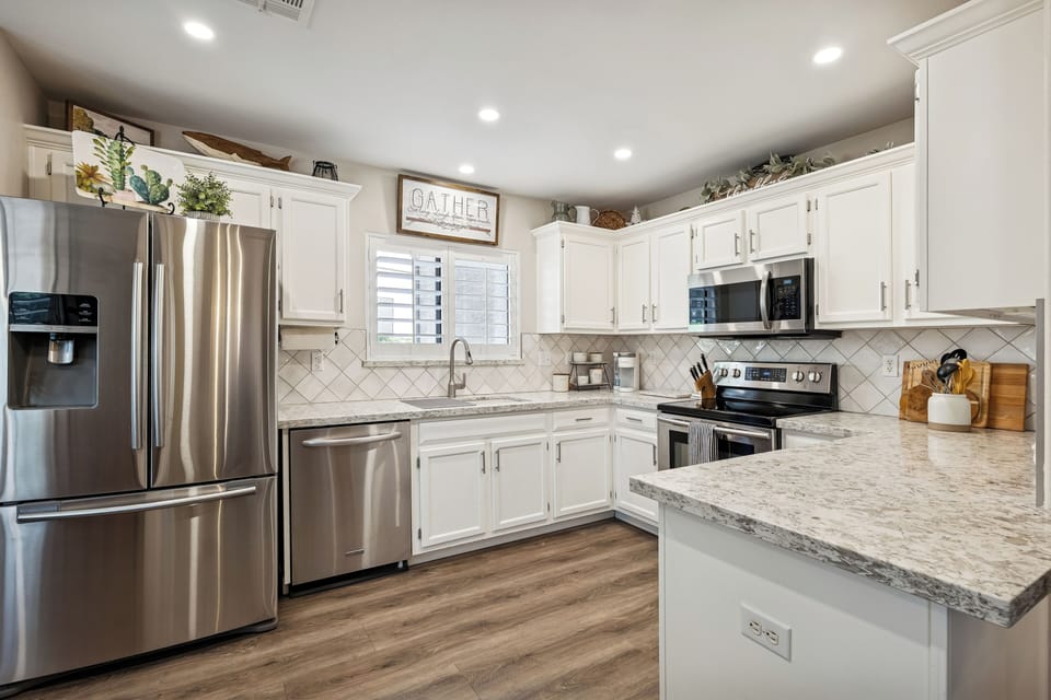 Full size stainless steel appliances.