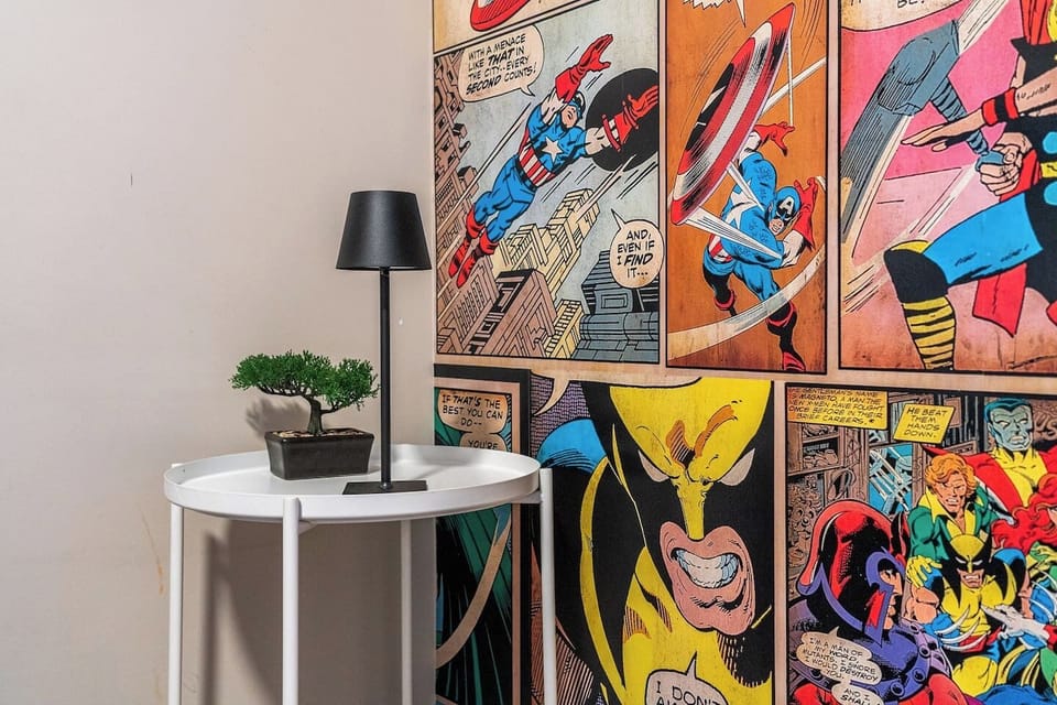 Second bedroom (the `Marvel Room`), located upstairs, with a double bed, a dress, closet and blackout blinds