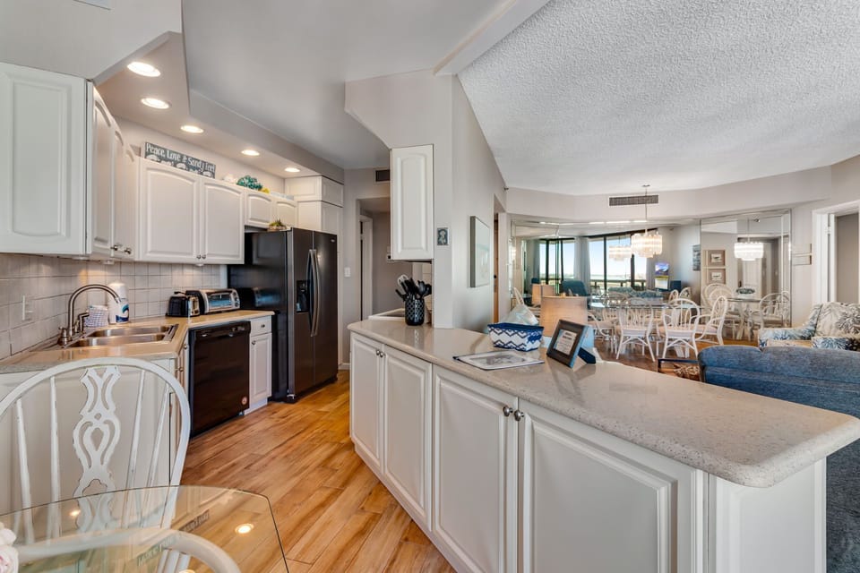 Full size kitchen with all new appliances and well stocked kitchen. 
