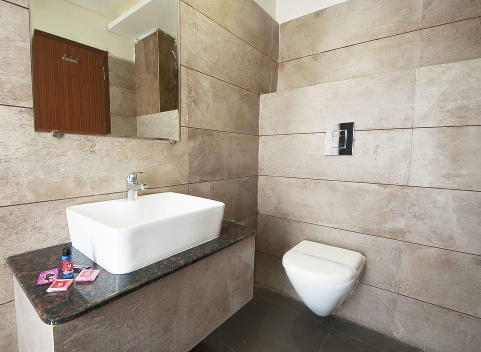 Shower, free toiletries, slippers, towels