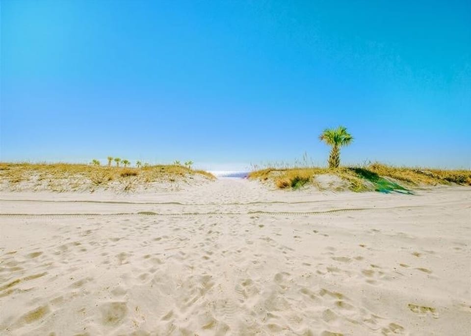 Walk on to the beach from our pool side deck
