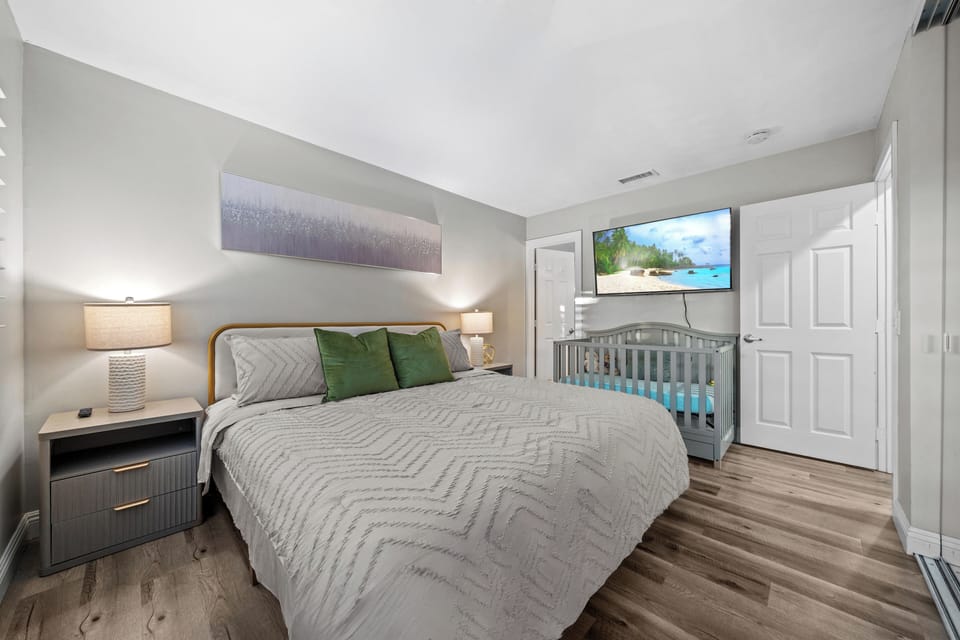 The master bedroom has a king bed and a crib for your little ones