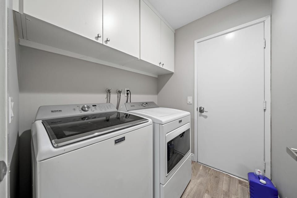 In-unit washer and dryer for convenient laundry anytime.