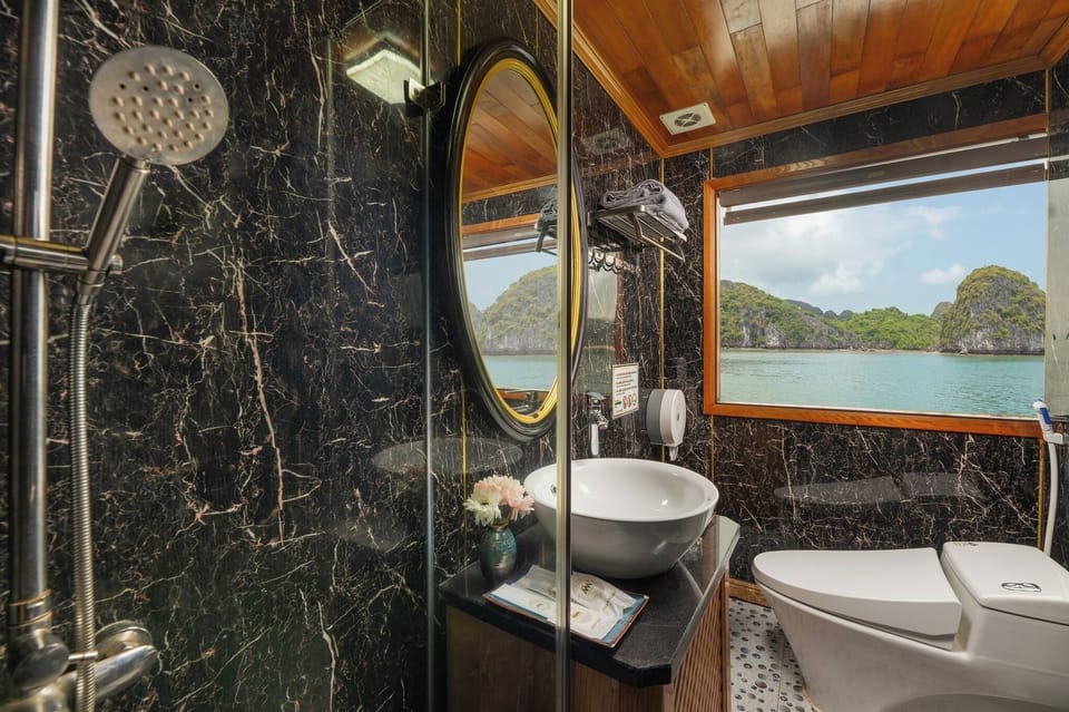 Deluxe Double or Twin Room, Bay View | Bathroom | Shower, slippers, towels, soap