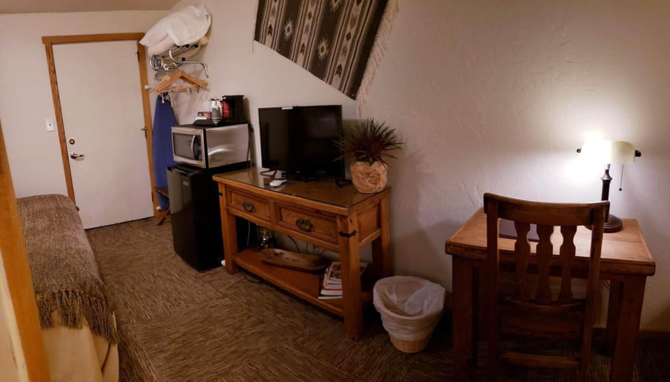 32-inch flat-screen TV with satellite channels, TV