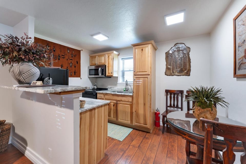 Executive Suite, 2 Bedrooms, Kitchen | Living area | 32-inch flat-screen TV with satellite channels, TV
