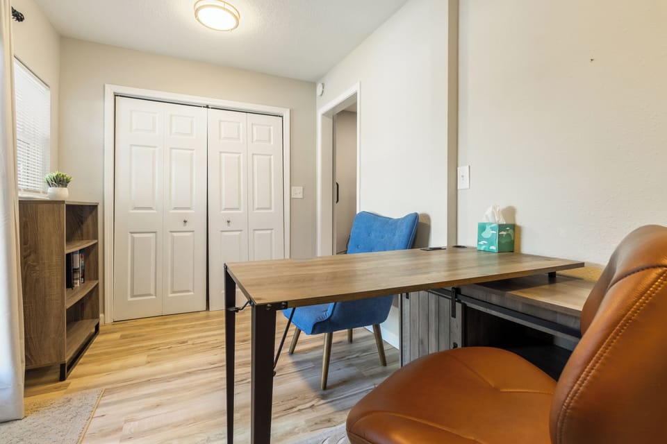 Cozy private workspace with desk and comfy seating 🖥️