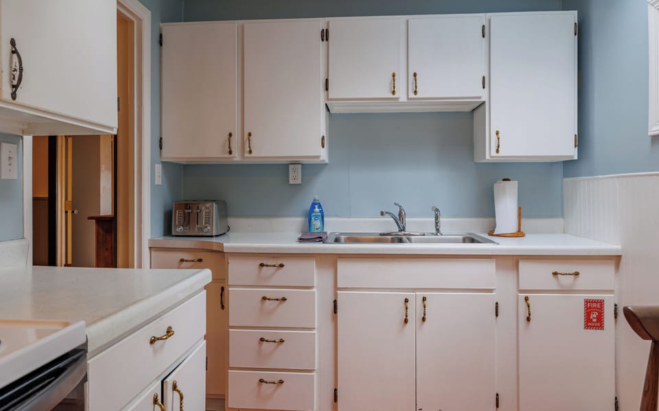 The kitchen offers plenty of room to prepare and clean up meals