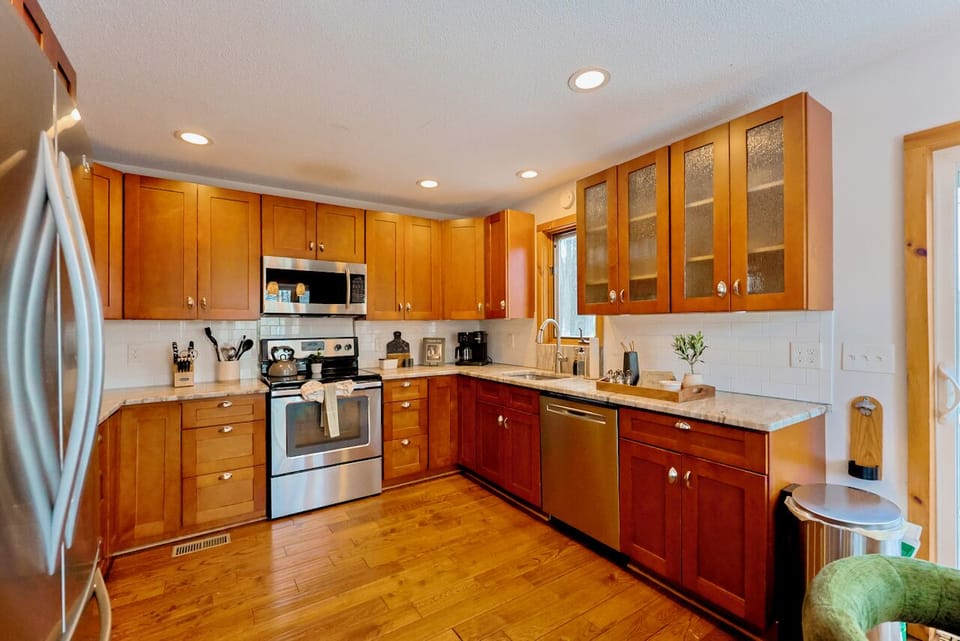Fully Stocked Kitchen • Stainless steel appliances • Granite countertops