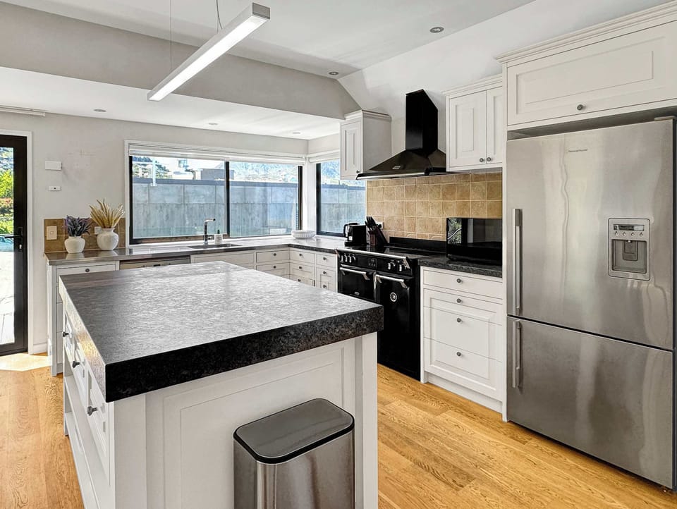 Open-plan kitchen and dining filled with natural light