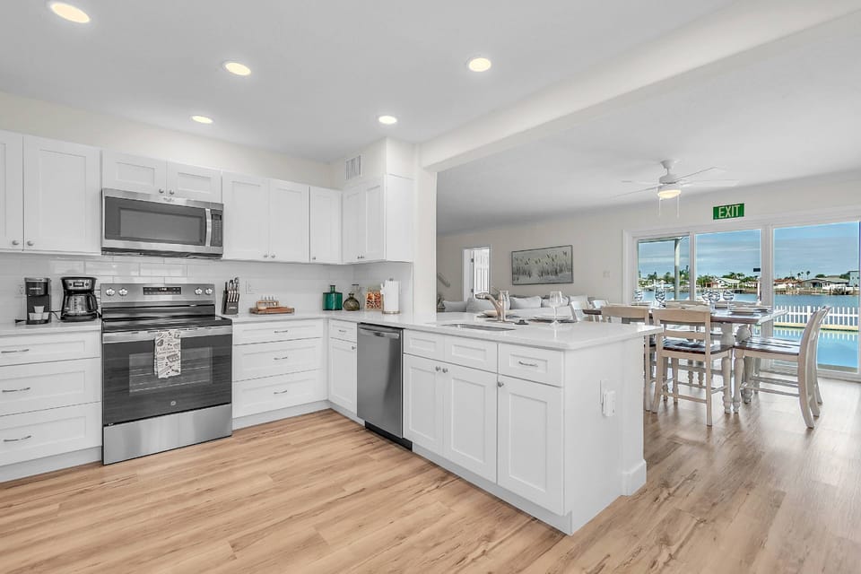 Kitchen and dining room with water view
