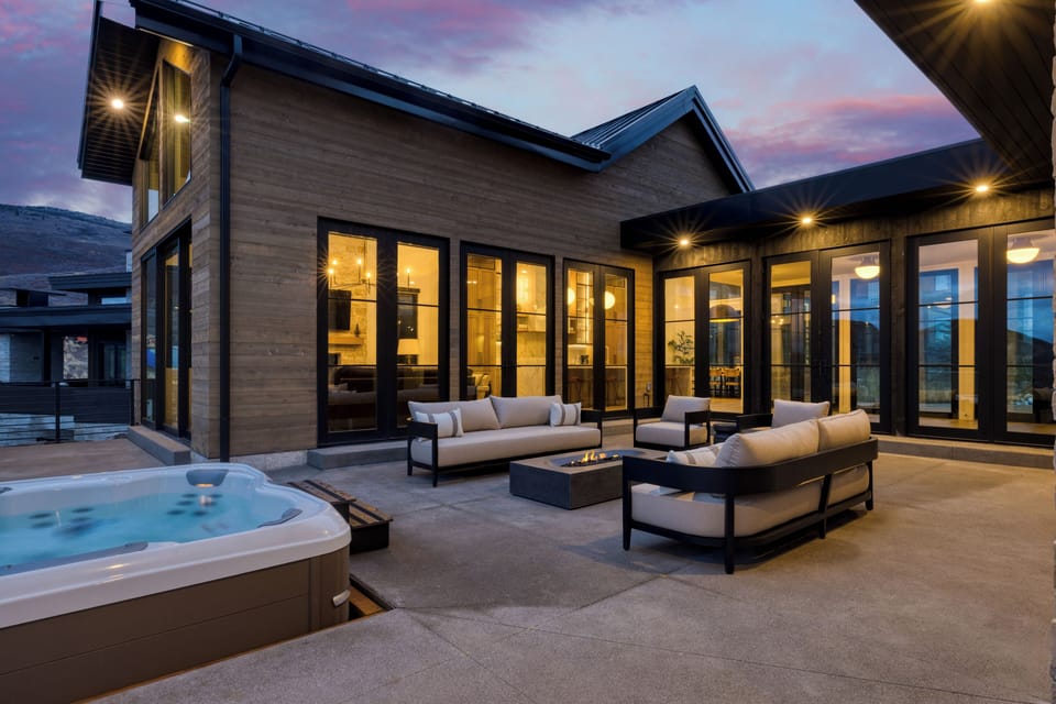 Relax by the fire or unwind in the hot tub while taking in panoramic mountain scenery.