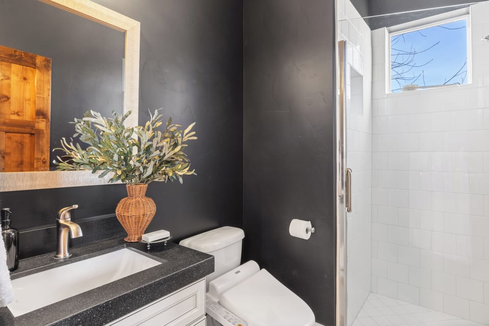 Full bathroom 3 features a shower.