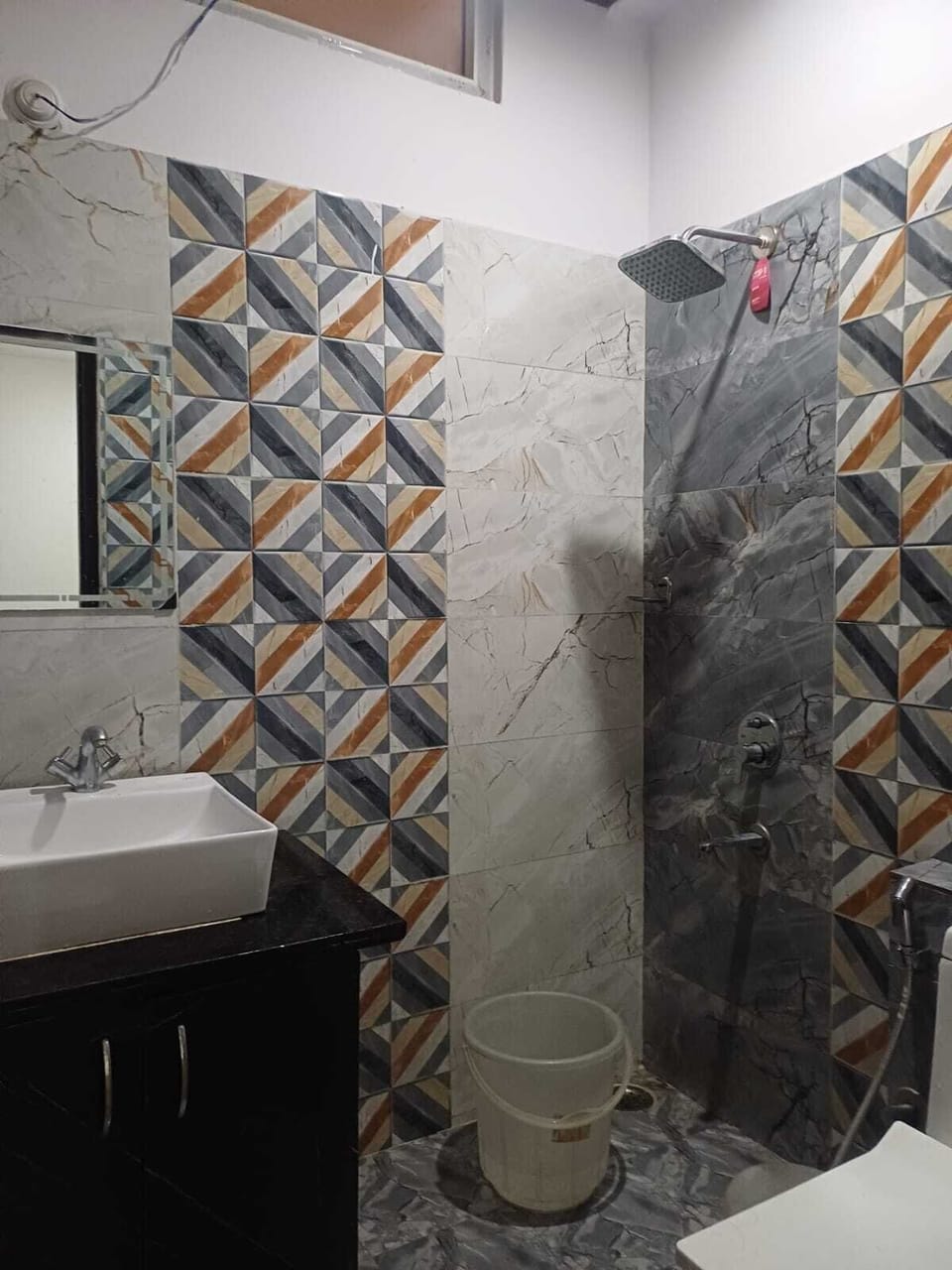 Separate tub and shower, towels, soap, toilet paper