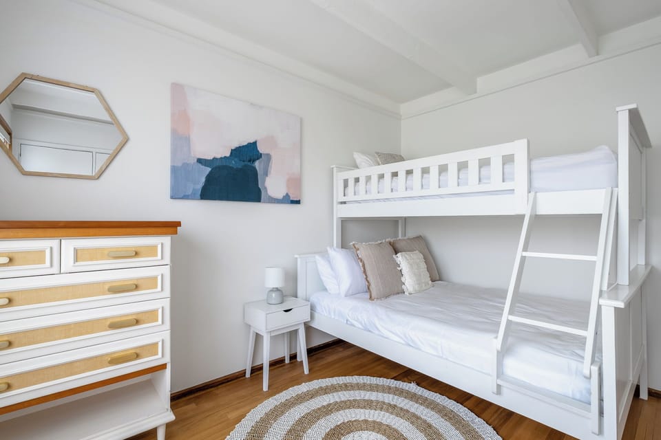 Bunk bed: Double at the bottom and single at the top