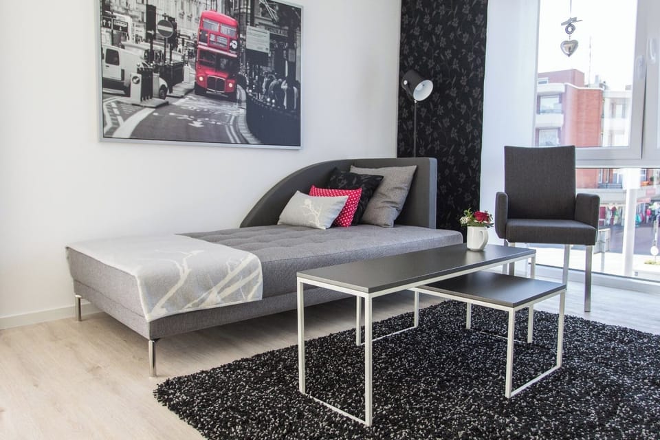 Apartment, Balcony, City View | Living area | 40-inch flat-screen TV with satellite channels, TV