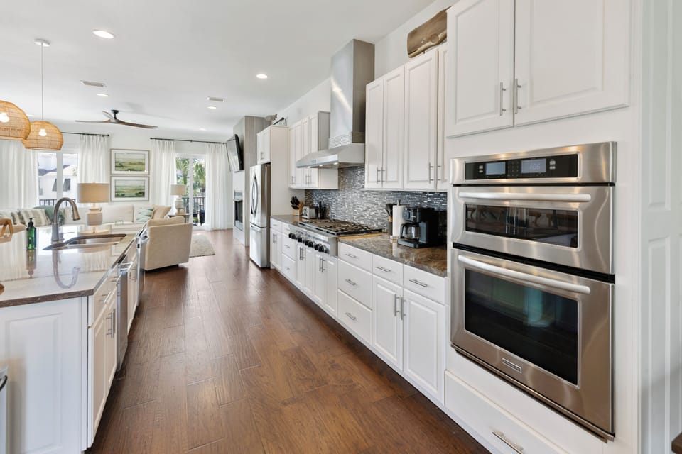 Your gourmet kitchen awaits with granite counters, stainless appliances, and everything needed to create memorable vacation meals together.