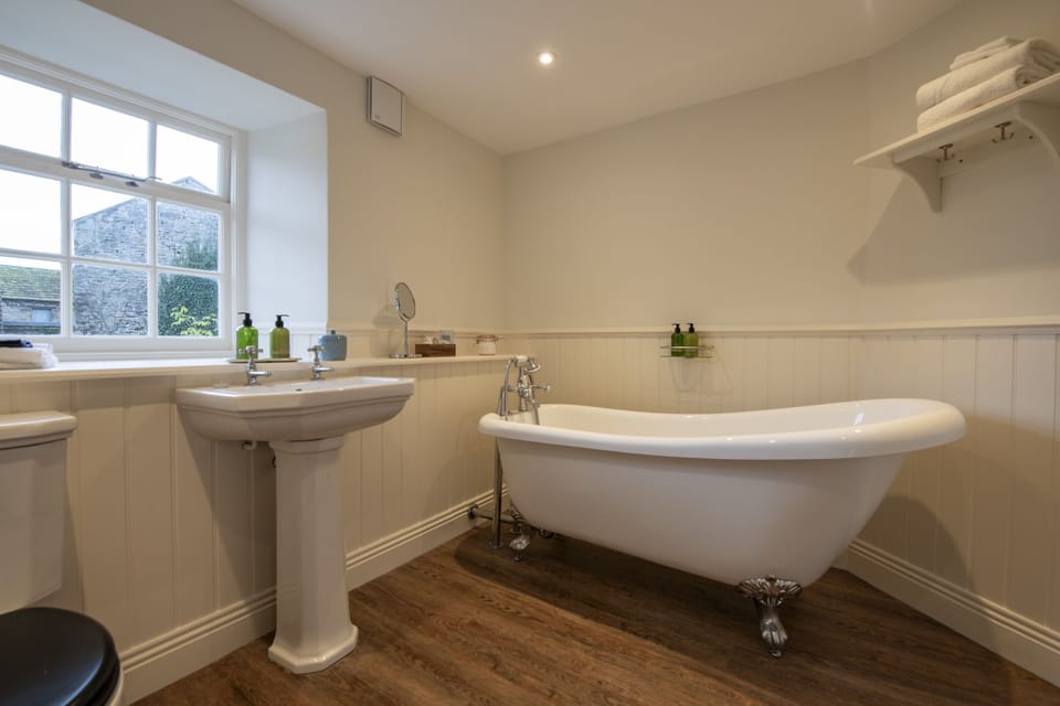 First floor:  En suite bathroom looking out towards Middleham Castle