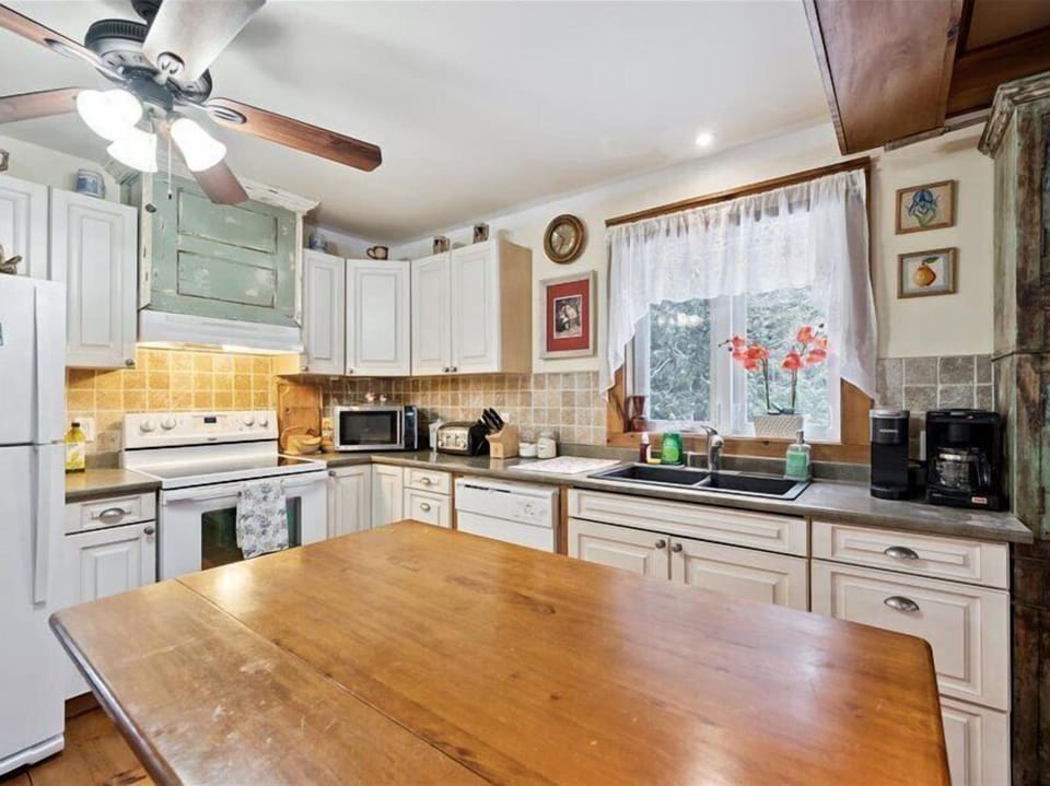 Kitchen island and workspace with plenty of room for meal prep and morning coffee.