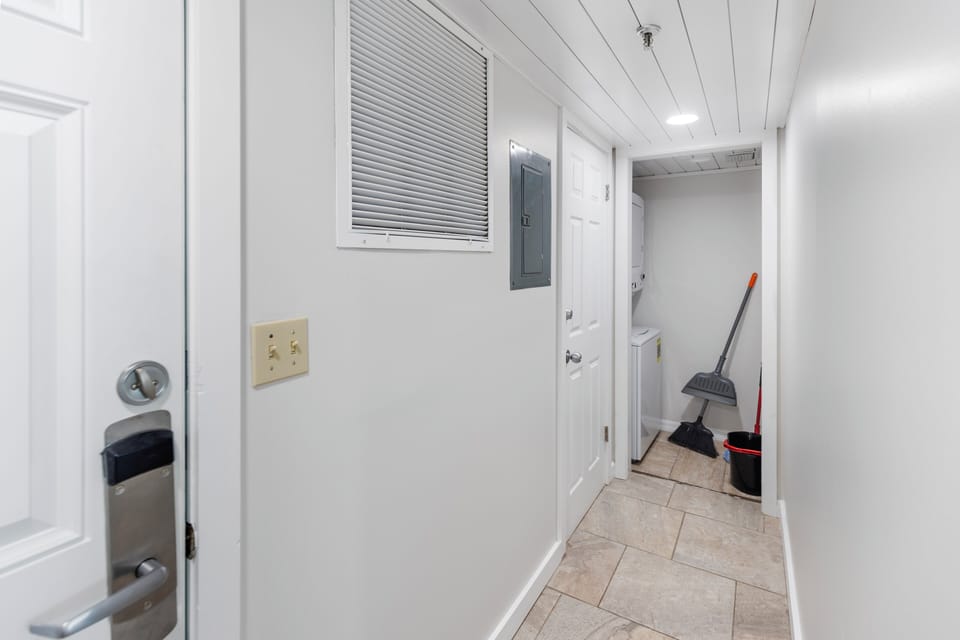 Step into your bright, clean hallway with modern finishes and practical storage - everything you need is within easy reach.