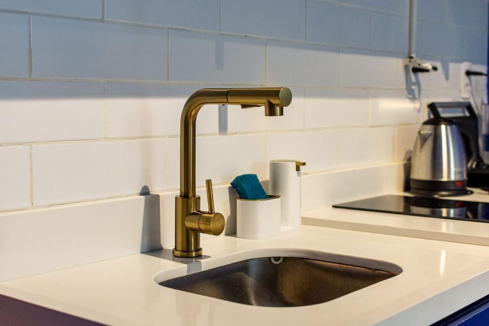 Luxury Apartment, Kitchen, Beachside | Private kitchen | Mini-fridge, microwave, stovetop, espresso maker
