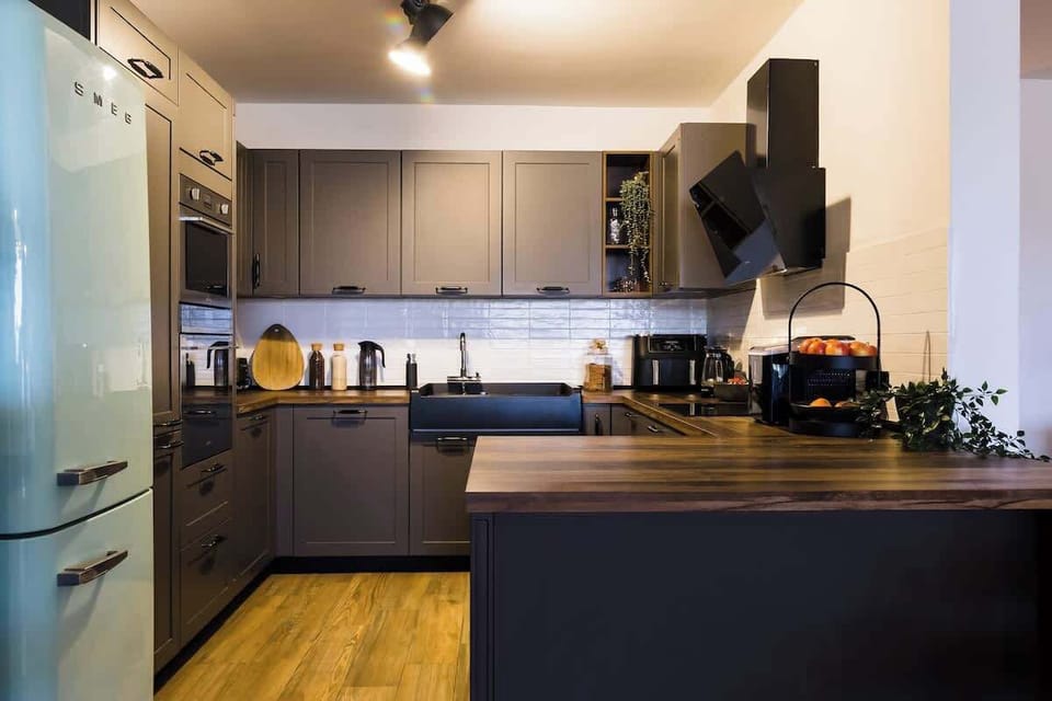 Experience the perfect blend of style and functionality in this fully-equipped kitchen, ideal for preparing memorable meals with high-end appliances and thoughtful design.