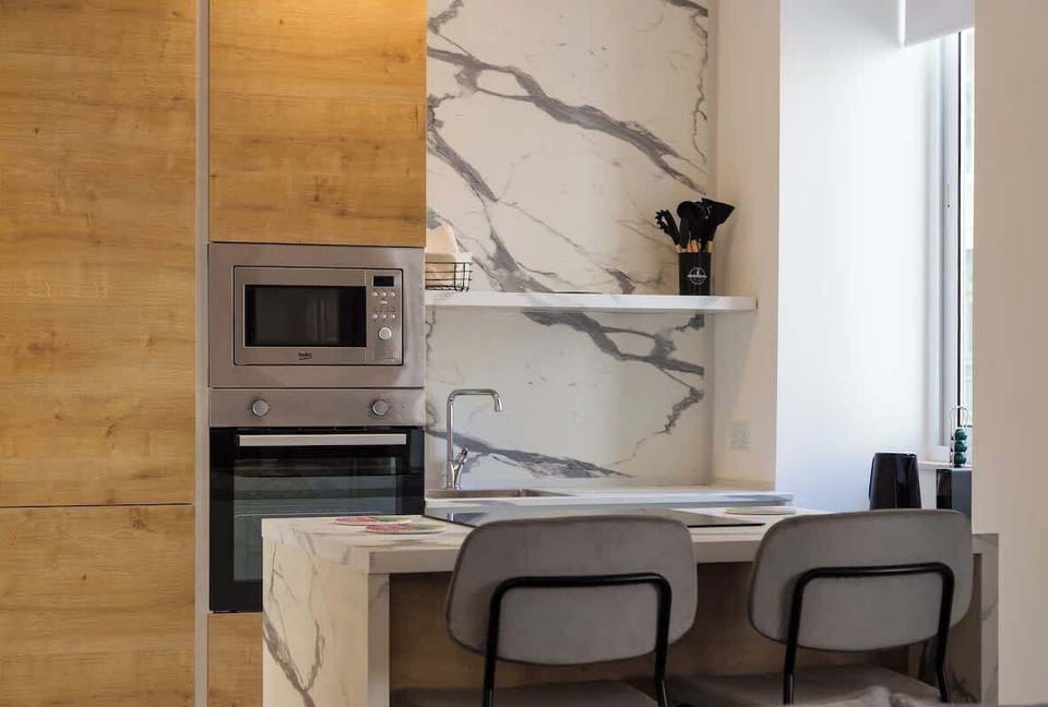 Foodie-ready kitchen - induction hob, full oven, dishwasher and barista coffee kit await.